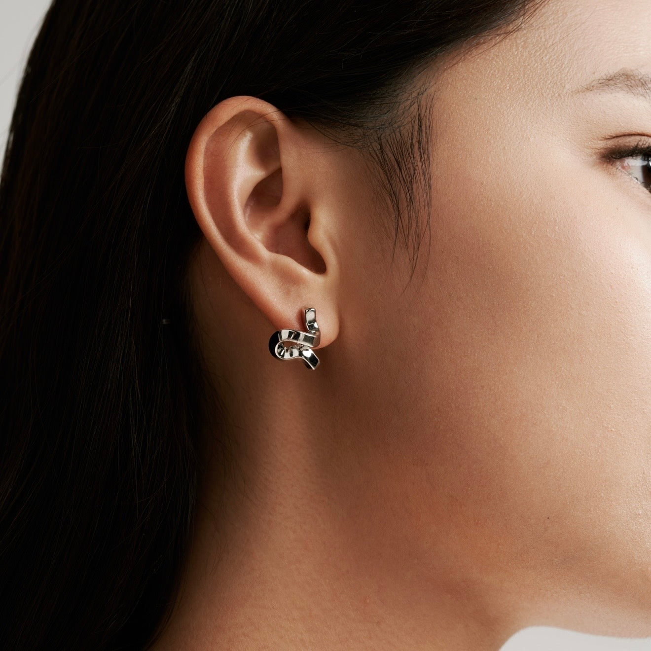 eternal knot curve earrings