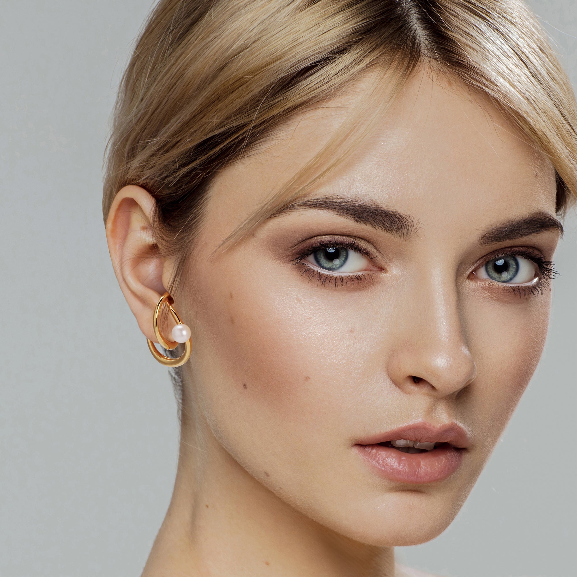 Infinity Pearl Ear Cuff in Gold on Model